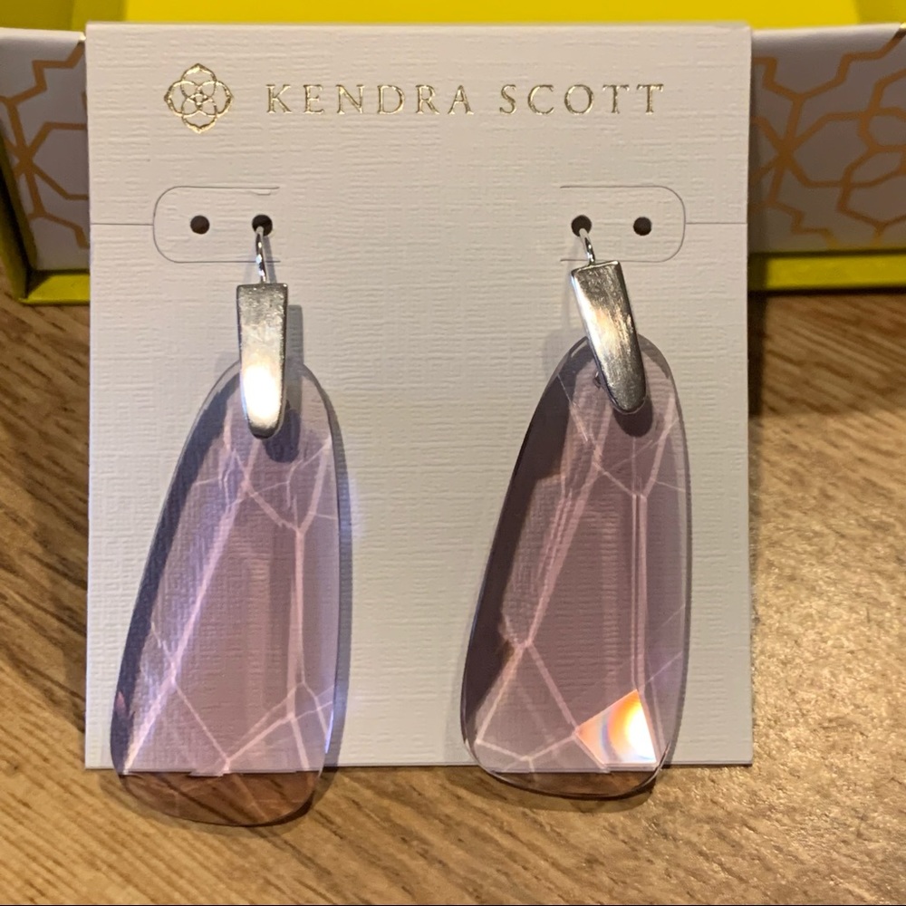 Kendra Scott earrings.